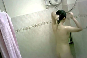 Tiny asian teen bathing spycam